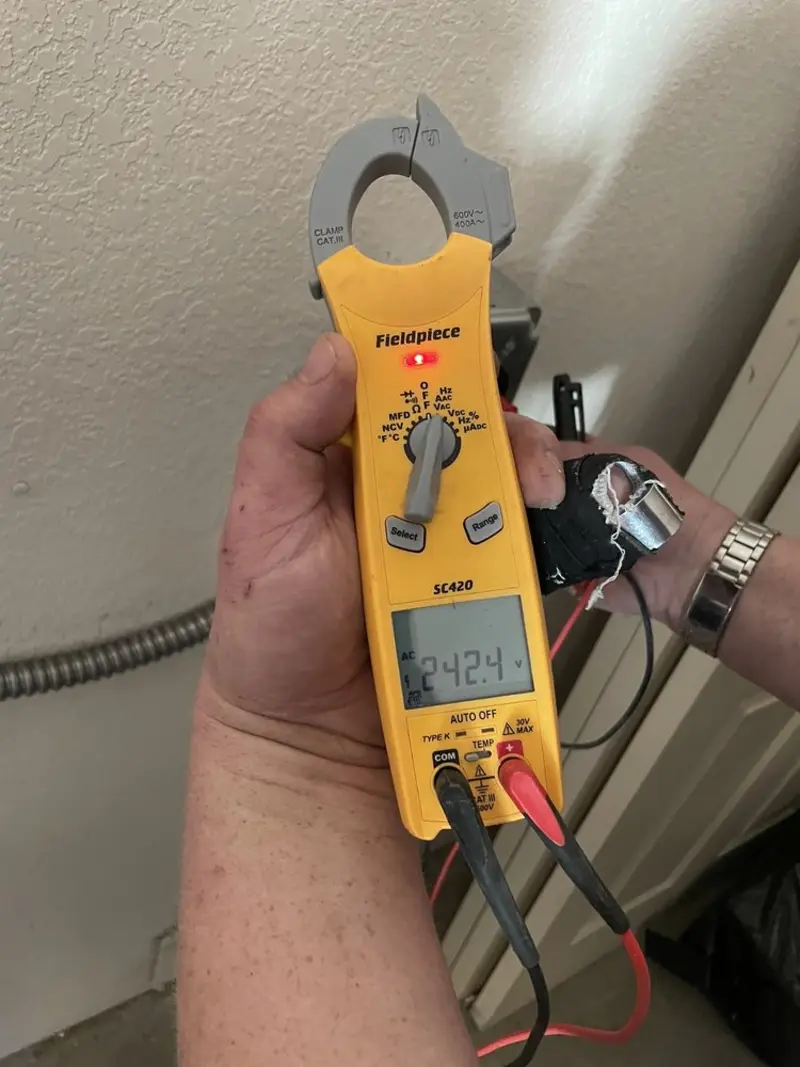Voltage testing with clamp meter during Generator Installation in Whitehouse
